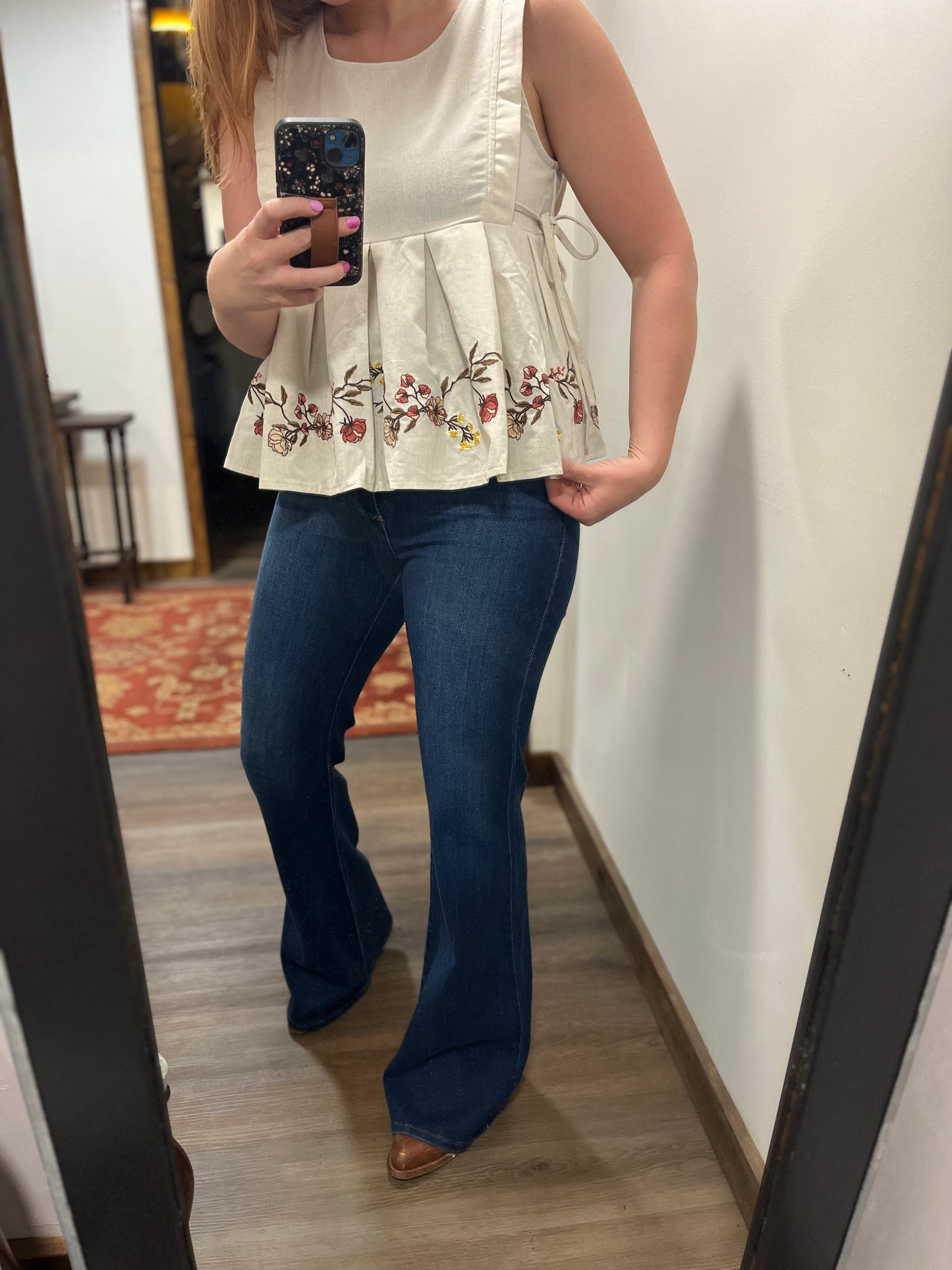 EMBROIDERED SLEEVELESS PLEATED PEPLUM TOP
